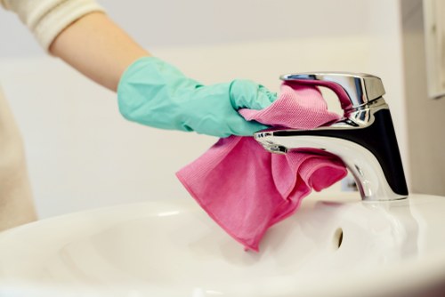 Cleaners in Elephant and Castle demonstrating insured and safe cleaning practices