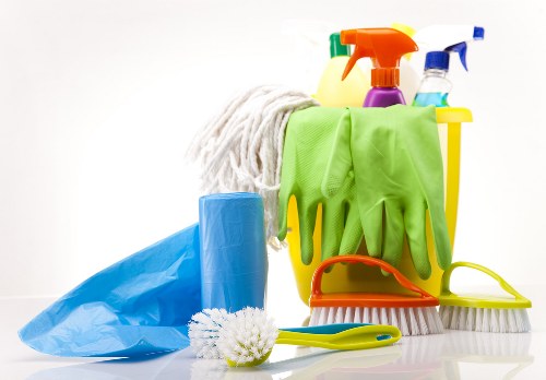Deep cleaning kitchen surfaces and appliances before a tenancy handover