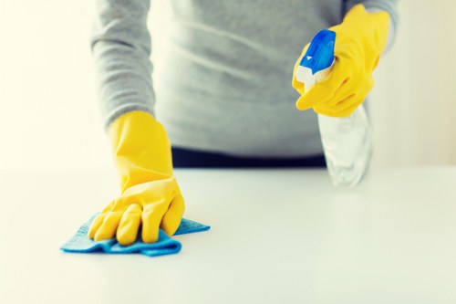 Staff wearing PPE during professional cleaning work